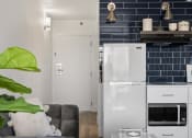 Thumbnail 1 of 8 - The Franklin Entrance and Model Kitchen