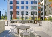 Thumbnail 2 of 29 - Geo Apartments Outdoor Seating Area