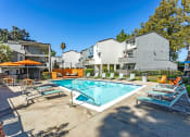 Thumbnail 8 of 10 - TrailView Apartment Homes in Concord, California Pool with Lounge Chairs