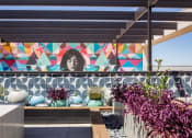 Thumbnail 33 of 35 - Trovita Rio Apartments in Tempe, Arizona Patio and Wall Mural