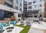 Thumbnail 28 of 35 - Trovita Rio Apartments in Tempe, Arizona Patio with Seating and BBQ's