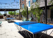 Thumbnail 32 of 35 - Trovita Rio Apartments in Tempe, Arizona Patio with Ping Pong