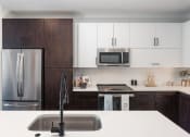 Thumbnail 2 of 35 - Trovita Rio Apartments in Tempe, Arizona Model Kitchen with Island