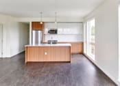 Thumbnail 6 of 26 - Multnomah Station Apartments kitchen with open space