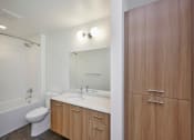 Thumbnail 10 of 26 - Multnomah Station Apartments bathroom with storage