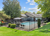 Thumbnail 7 of 18 - the preserve at ballantyne commons pool and fenced in yard with a house