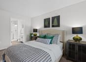 Thumbnail 9 of 43 - a bedroom with a large bed in a 555 waverly unit