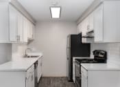 Thumbnail 19 of 39 - Novela Apartments Kitchen Counters and Appliances