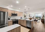 Thumbnail 3 of 26 - Vela Apartments Kitchen and Living Romm