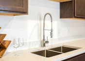 Thumbnail 39 of 48 - Vicinity at Horn Rapids Apartments Model Kitchen Faucet