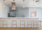 Thumbnail 22 of 48 - Vicinity at Horn Rapids Apartments Clubhouse Kitchen