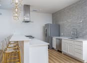 Thumbnail 23 of 48 - Vicinity at Horn Rapids Apartments Clubhouse Kitchen