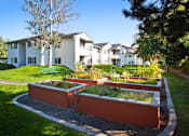 Thumbnail 13 of 20 - Village on Broadway Apartments in Spokane Valley, Washington Garden