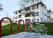 Thumbnail 14 of 20 - Village on Broadway Apartments in Spokane Valley, Washington Bike Rack