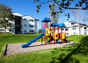Thumbnail 11 of 20 - Village on Broadway Apartments in Spokane Valley, Washington Playground