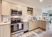 Thumbnail 10 of 37 - Voda_Kirkland_WA_Apartment_ModernKitchen
