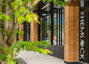 Thumbnail 18 of 19 - a building with a tree in front of it at The Hemlock, Seattle 