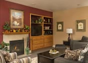 Thumbnail 3 of 8 - Woodbridge Apartments Clubhouse Lounge with Fireplace