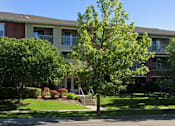 Thumbnail 7 of 8 - Woodbridge Apartments Exterior
