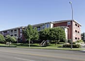 Thumbnail 5 of 8 - Woodbridge Apartments Exterior