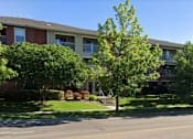 Thumbnail 6 of 8 - Woodbridge Apartments Exterior