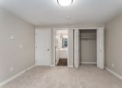 Thumbnail 34 of 39 - Novela Apartments Bedroom with Bathroom Door