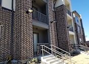 Thumbnail 10 of 13 - Building view at SEVEN TWELVE LOFTS Apartments, Denton, Texas