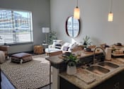 Thumbnail 3 of 27 - A kitchen with a sink, a mirror, and a rug at Urban Square, Denton, TX, 76210