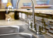Thumbnail 6 of 27 - a kitchen sink with a faucet in a kitchen at Urban Square, Denton, Texas, 76210