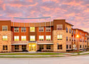 Thumbnail 25 of 27 - a building at sunset with the sky in the background at Urban Square, Denton, 76210