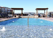 Thumbnail 18 of 27 - the pool is heated and has views of the mountains and the sky at Urban Square, Denton, 76210