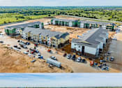 Thumbnail 9 of 11 - A construction site with multiple buildings under construction.