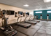 Thumbnail 23 of 27 - 24/7 fitness center and yoga room at 985 High Apartments, Ohio, 43201