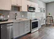 Thumbnail 2 of 27 - Fully Equipped Kitchen at The Beeker, Columbus, Ohio