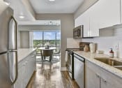 Thumbnail 9 of 66 - Spacious kitchen with large island and beautiful view at CityView on Meridian, Indiana, 46208