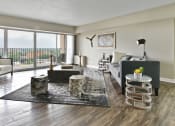 Thumbnail 1 of 66 - Large open living room with large windows and a view of the city at CityView on Meridian, Indianapolis, IN,46208