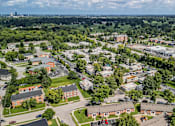 Thumbnail 37 of 38 - A bird's eye view of a residential area with houses and trees.