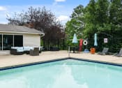 Thumbnail 27 of 39 - Swimming Pool with Lounge Seats at Heritage Hill Estates Apartments, Cincinnati, Ohio 45227