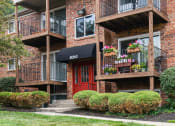 Thumbnail 30 of 39 - Exterior view of buildings with private balconies at Heritage Hill Estates Apartments, Cincinnati, Ohio 45227
