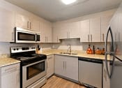Thumbnail 1 of 39 - A newly renovated kitchen with stainless steel appliances at Heritage Hill Estates Apartments, Cincinnati, Ohio 45227