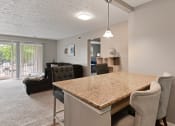 Thumbnail 2 of 39 - An open kitchen with large island for cooking or use as an eat in kitchen at Heritage Hill Estates Apartments, Cincinnati, Ohio 45227