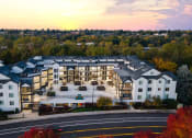 Thumbnail 46 of 48 - a rendering of an apartment building with a sunset in the background at River Walk Apartments, Idaho, 83702
