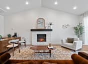 Thumbnail 34 of 40 - A living room with a fireplace and a mirror on the wall.