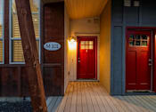 Thumbnail 15 of 61 - A red door is on the right side of the image. at Verraso Village Apartments, Meridian, Idaho