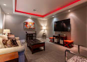 Thumbnail 28 of 35 - a living room with a couch and a tv at Corso Apartments, Missoula, MT
