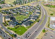 Thumbnail 46 of 60 - an aerial view of a neighborhood of houses with an intersection at The Vineyards of Colorado Springs, Colorado, 80920