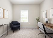 Thumbnail 11 of 26 - an office with a black chair and a wooden desk at The Alloy at Geneva, Vineyard, UT