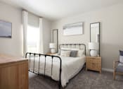 Thumbnail 10 of 26 - a bedroom with a bed in a room at The Alloy at Geneva, Vineyard, UT, 84058