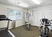 Thumbnail 12 of 26 - Cardio Machines at Country Oaks Apartments, Clearfield, 84015