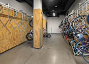 Thumbnail 21 of 23 - A room with a lot of bicycles and a wooden wall at Cannery Flats, Bozeman, Montana